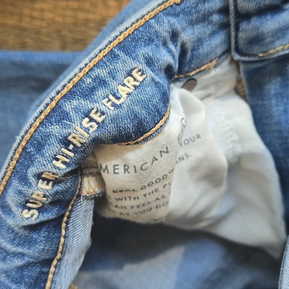 American Eagle Distressed Super High Rise Flare Size 0R - Picture 4 of 11